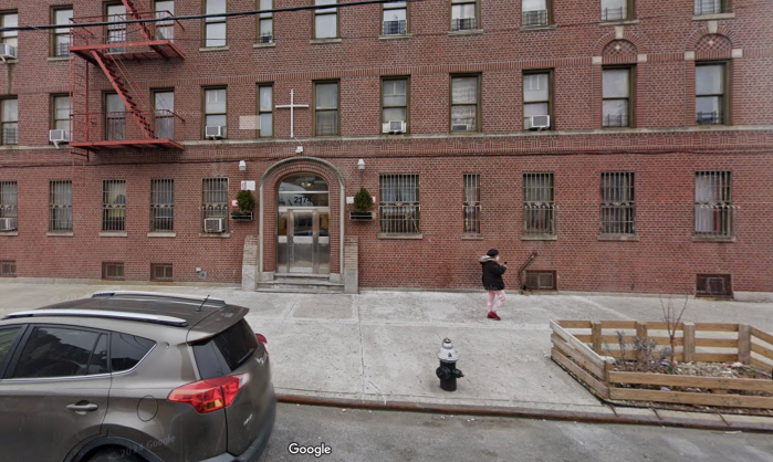 The street view of A.T.'s apartment building on Crotona Avenue where the harassment took place, according to court filings.